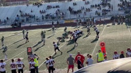 Tigers QB #9 Tama-Satoa Numera hand off to #1 Titan Bourchard for a gain in yards