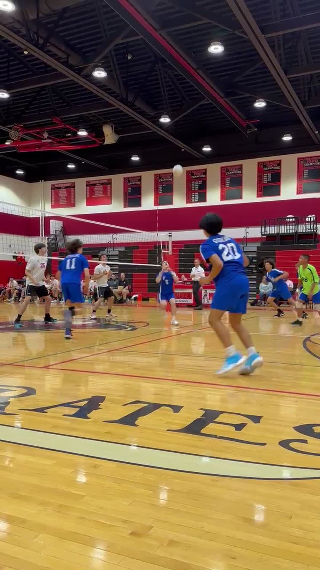 #15 across the court with a curly top