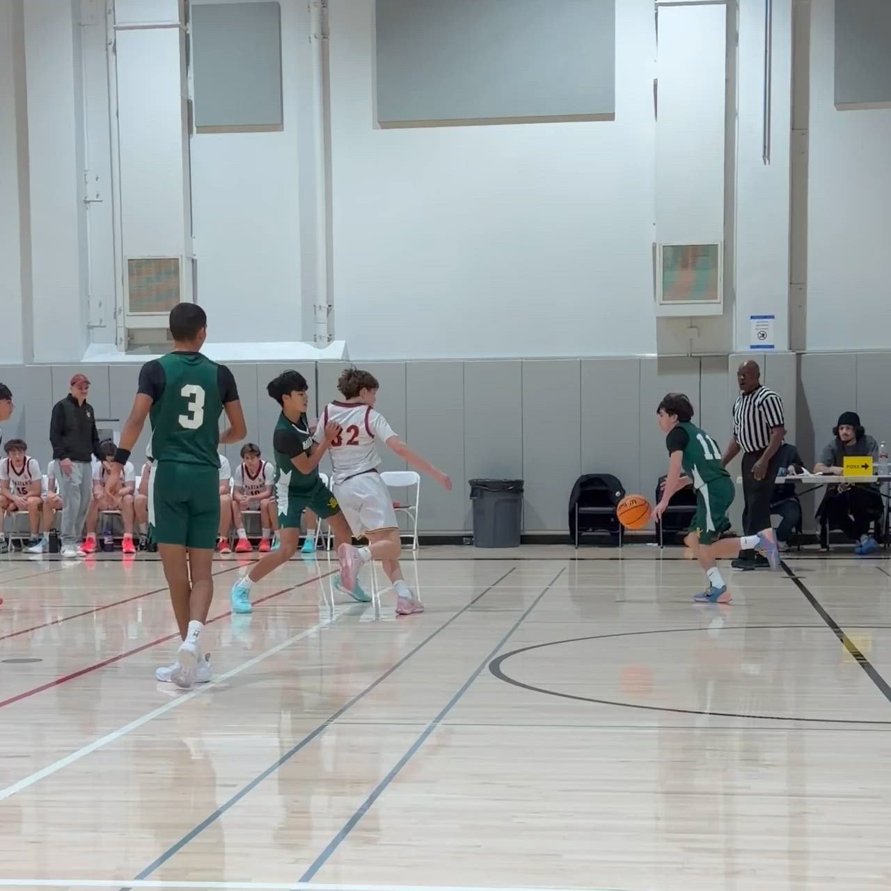 Damien Lomeli (5) with the basket. Ashton Kritzer (11) with the assist.