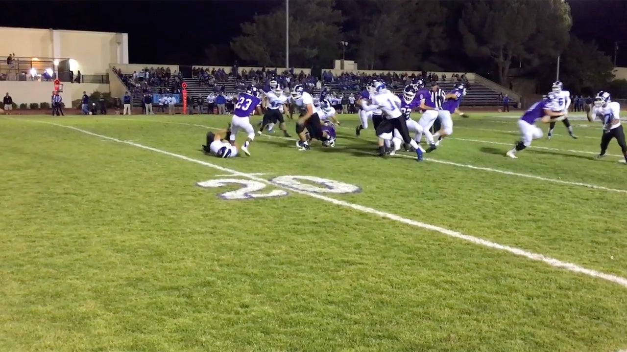 Anthony Lepori tackles Petaluma RB for a loss