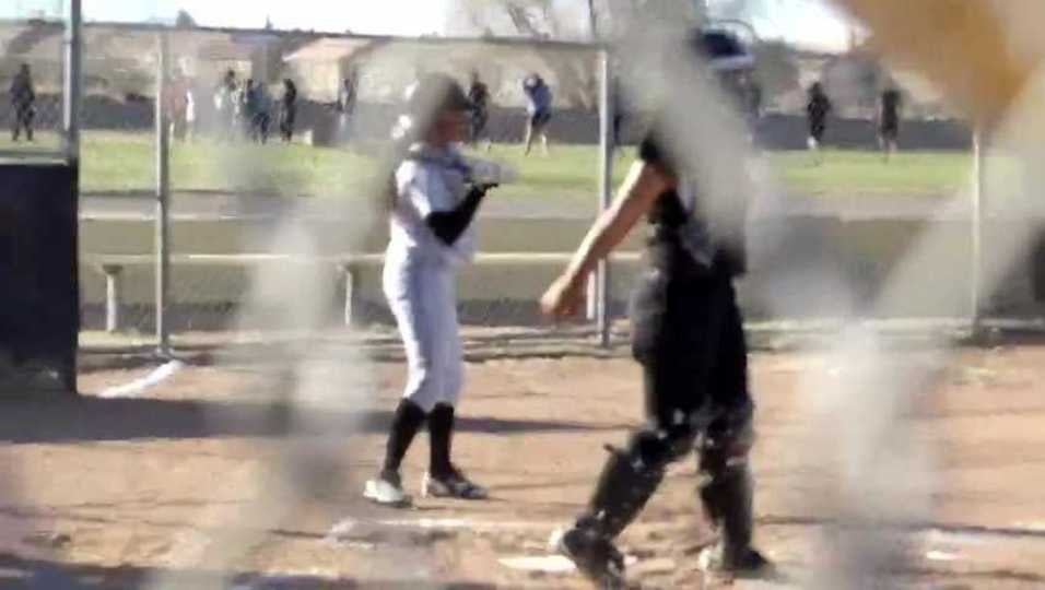 Alizae watches ball four, walk.