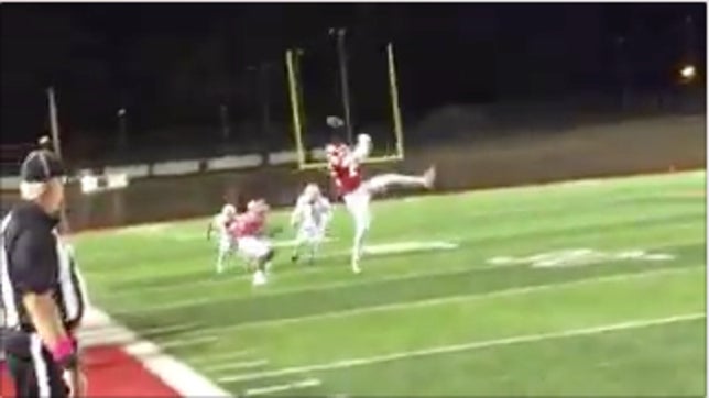 WR Carlos Hunt lucks out as he catches the tipped pass and then takes it all the way for the TD.