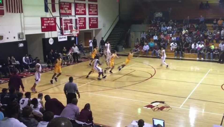 Dewayne Cox with the steal and 2 hand flush