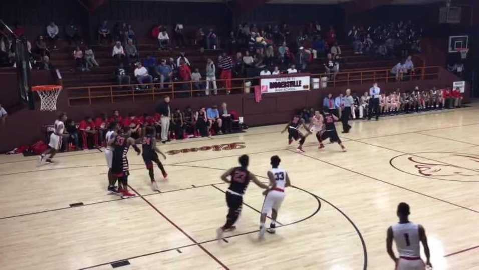 "ªC.J. Hurd "ªgets away from the double team and finds"¬ Money Welch"¬ "ªfor the open layup"¬