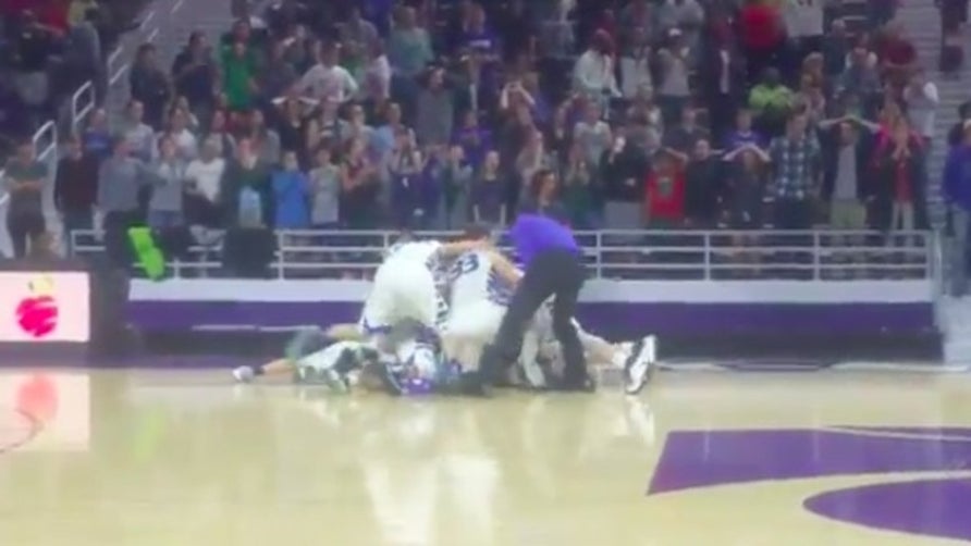 Cole Kinnamon of St. John's (KS) hits the 30-foot game-winning, buzzer-beater under duress in the 6th overtime to win and send his team to the Kansas Class 2A state championship game.