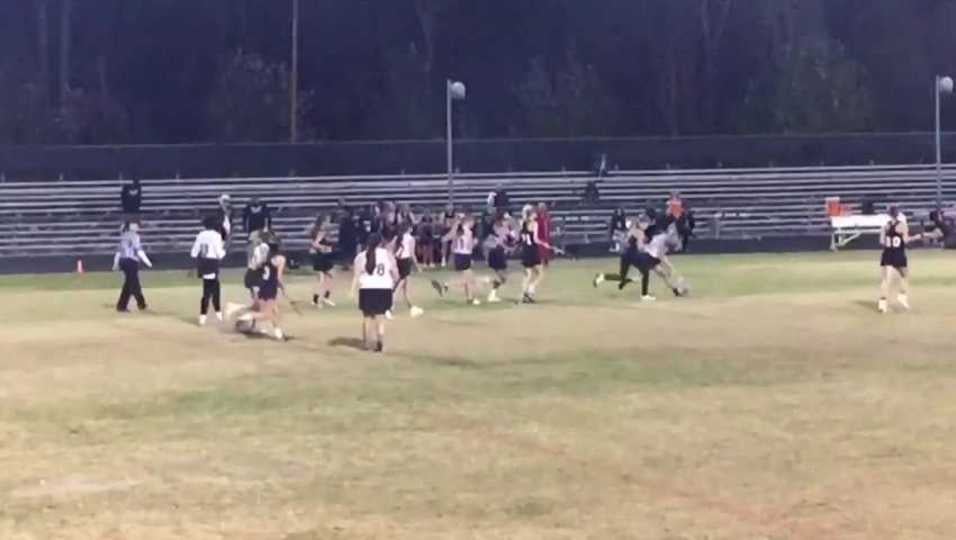 Kaitlyn Coleman breaks from the crowd to score against PHS