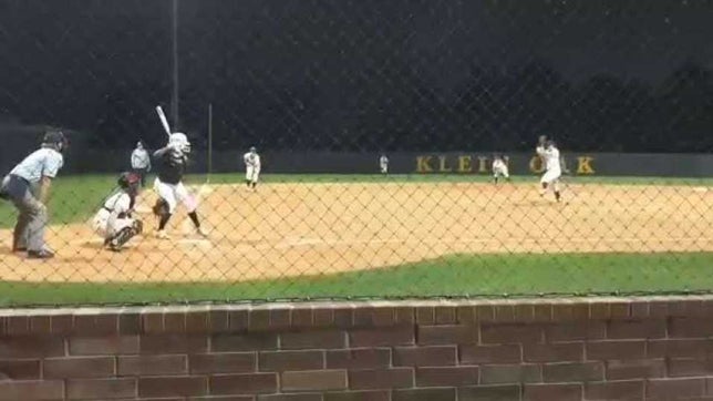 Brelyn Senegal hits homerun in game vs. Klein Oak High School.