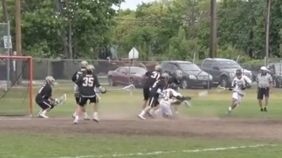 Over-the-shoulder no-look lacrosse goal
