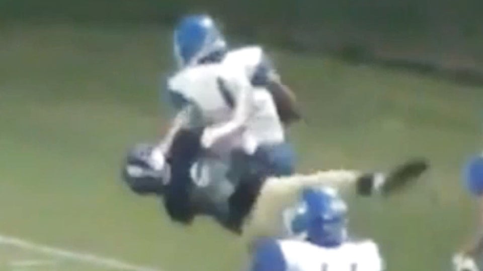 Running back throws defenders to the turf