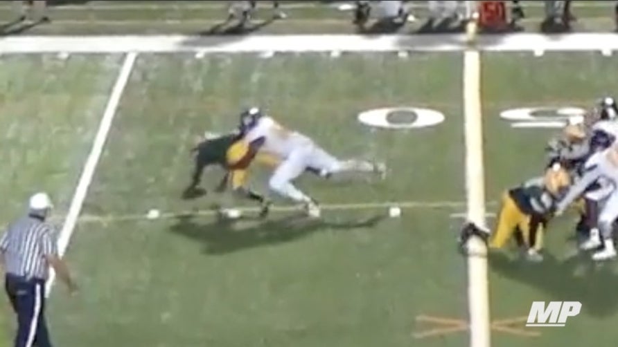 Michael Nesmith II of Hallandale (FL) puts his team on his back as he accelerates for the sack, recovers the fumble he created, and takes it all the way to the house for the touchdown.