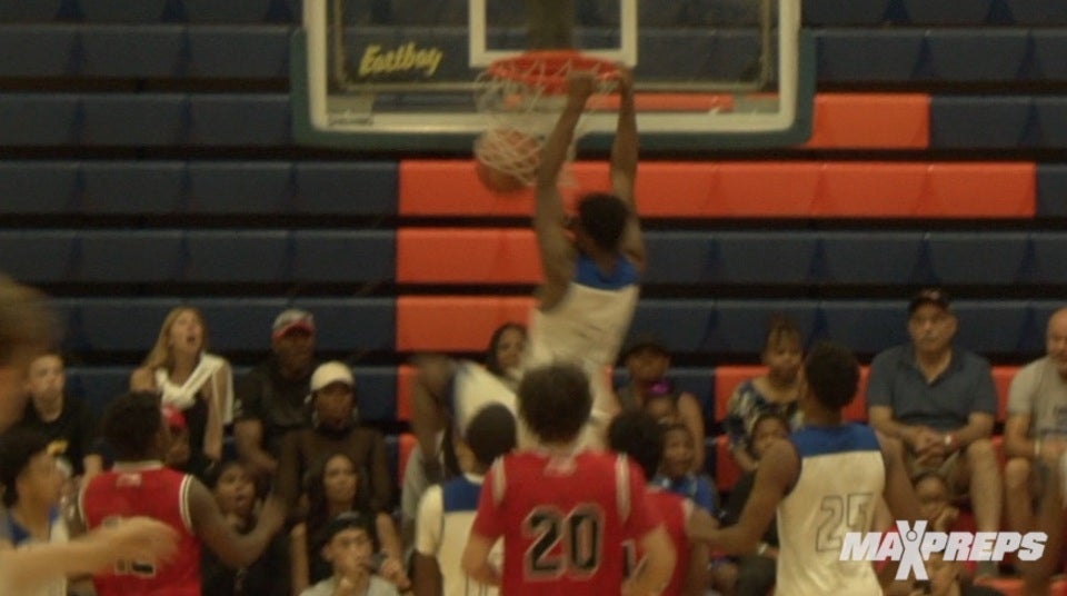 Kyree Walker takes flight against Wade Elite