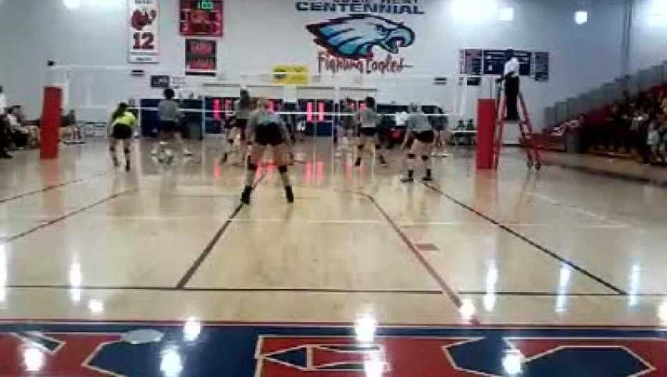 Claudia magne #11 in yellow District 8-9A championships VS Martin County HS