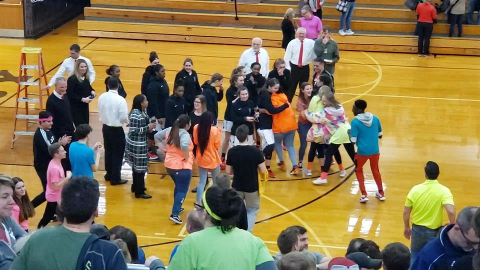 Players and Fans celebrate the W 3/7/20