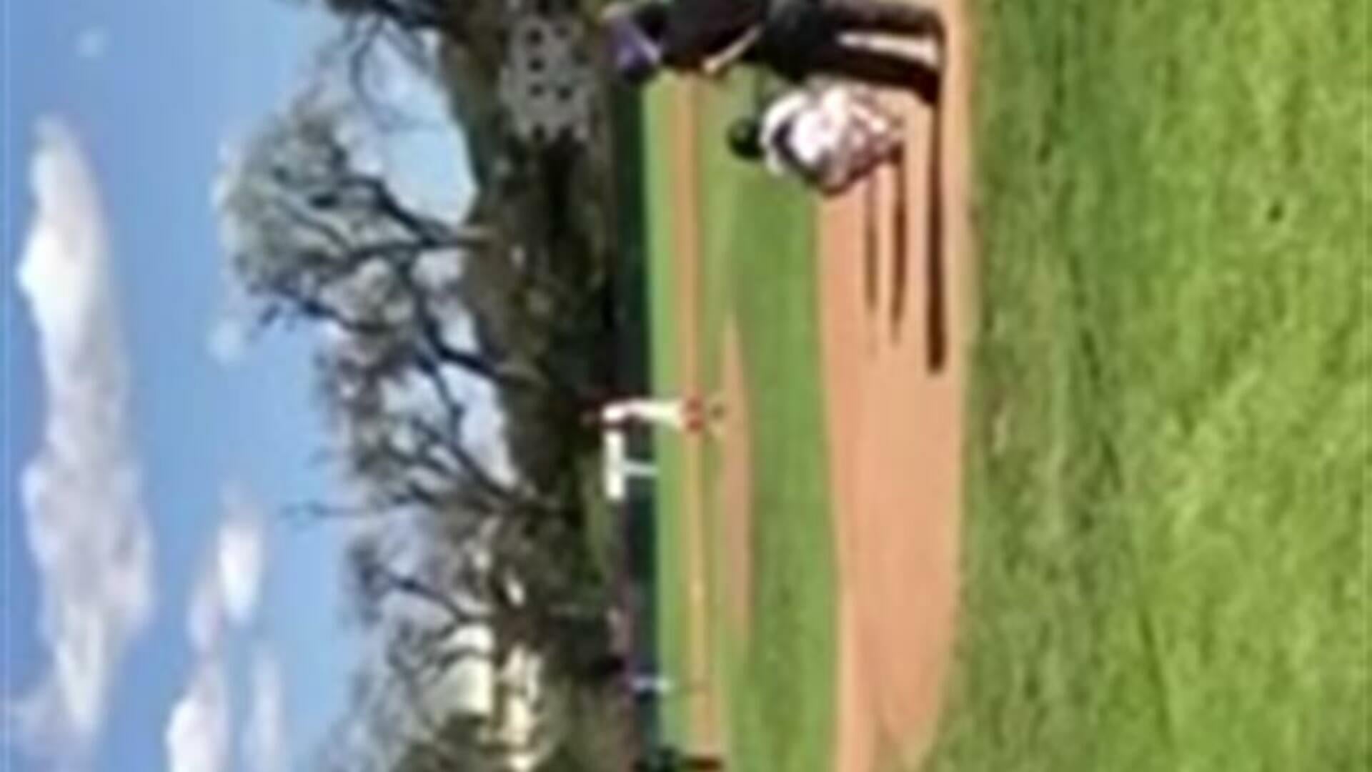 Lucas Burton hits a bomb over the right field fence