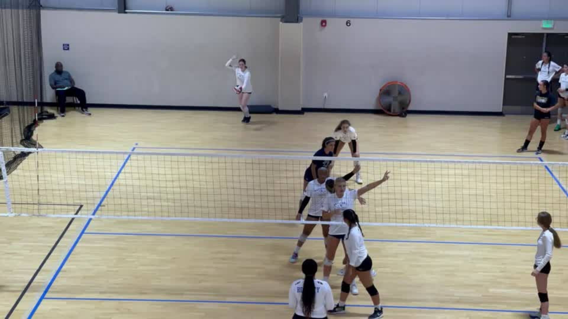 Sophomore S/DS Lauren Reiter service ace