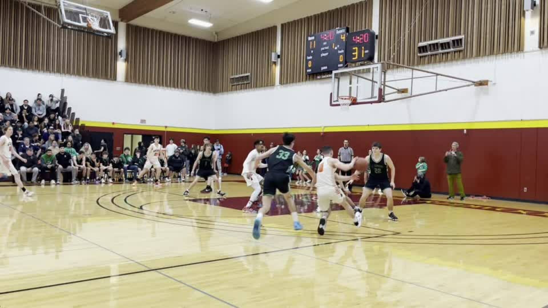 #25 Kalani Butor hits his 3rd 3 of the 1st quarter against St. Bernards