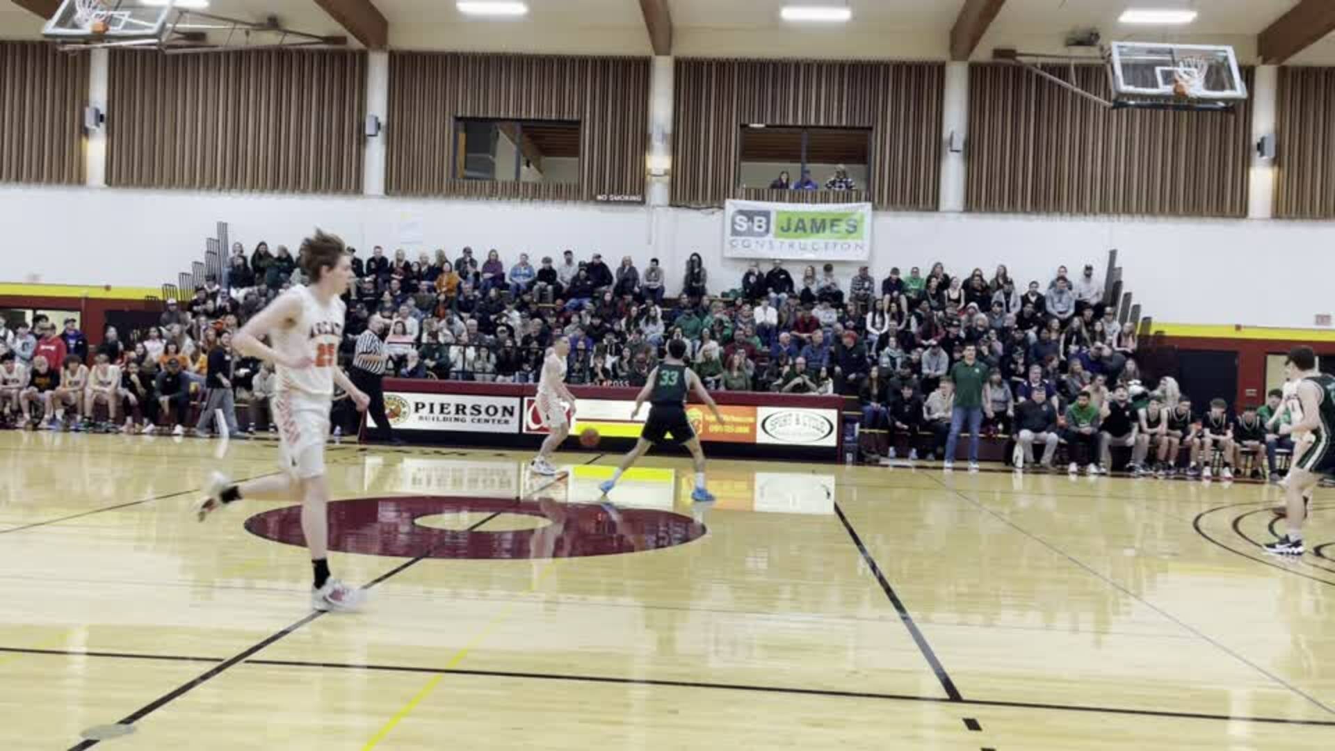 #25 Kalani Butor opens the first quarter with four 3 point field goals, here is #1