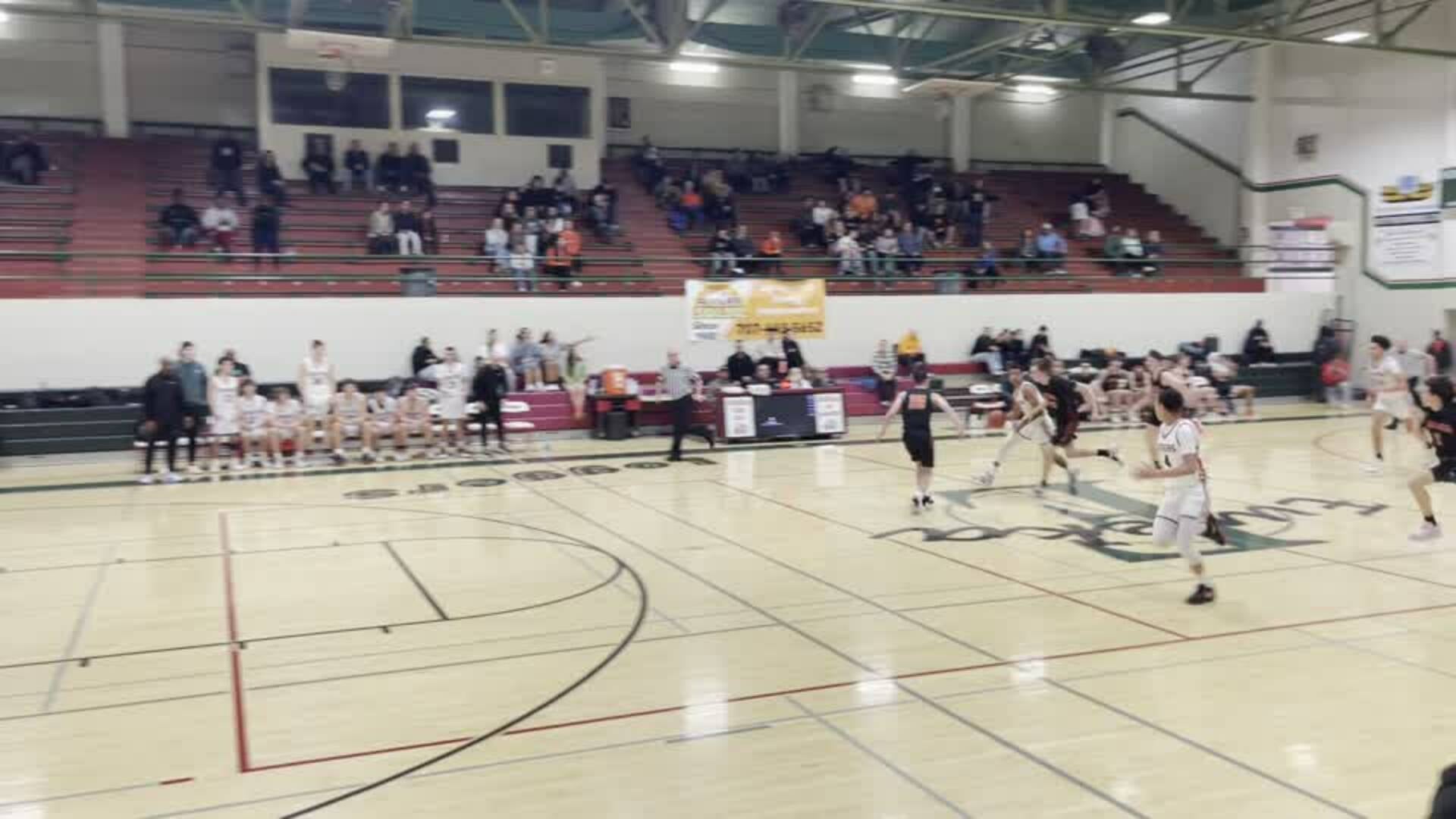 #25 Kalani Butor with the chase down block