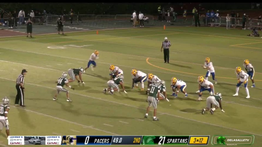 De La Salle's Ant Dean rips the ball away from QB and takes it back to the house.