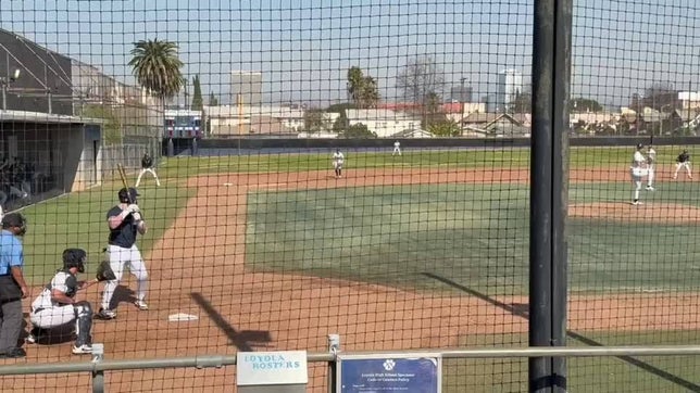 Catcher Luca Marucci lays out to catch a bunt foul popup