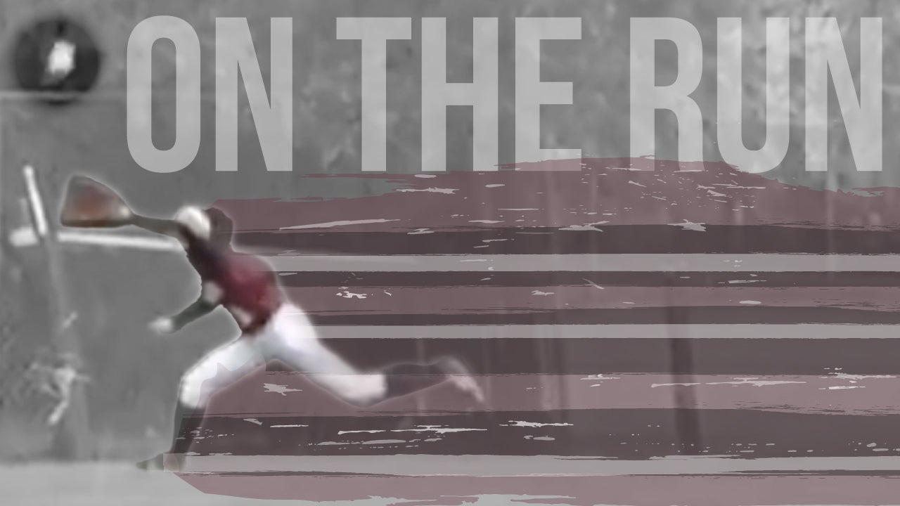 Outfielder runs down fly ball