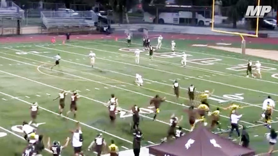 Crespi's (CA) JV teams pulls off a miracle finish with this game-winning hail mary as Darius Perrantes scrambles around and finds a wide open Jackson White in the end zone.

Video courtesy: Darius Pernates.