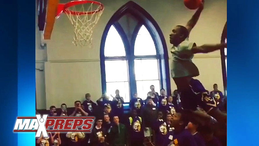 Roman Catholic (Philadelphia, Pa.) guard Nazeer Bostick dunks over four people