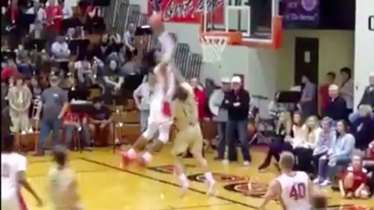 Indiana recruit slams home oop off backboard