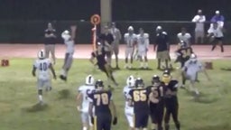 Ball tips off two defenders resulting in touchdown