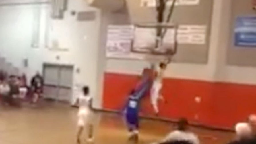 Teandre Jones throws down the breakaway jam.