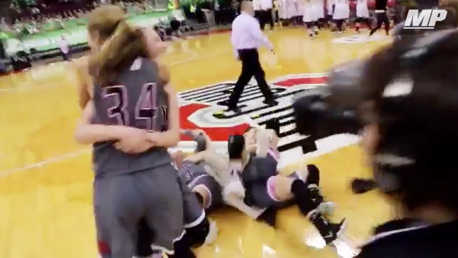 Hiland's (OH) Kennedy Schlabach hits a game-winning three-pointer at the buzzer in the Division IV semifinals playoffs against Ottoville (OH).

Video courtesy of Brandon Yoder / OhioSportsTicket.com.