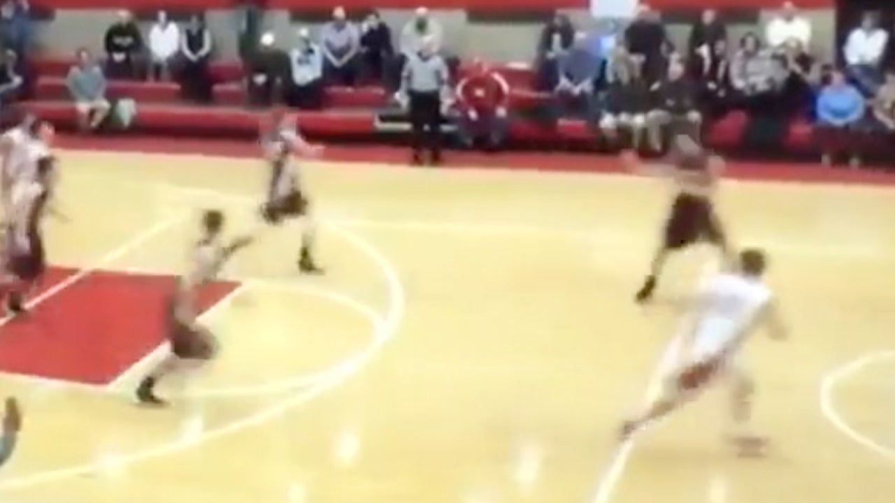 On the run... across the body... 3-Points!