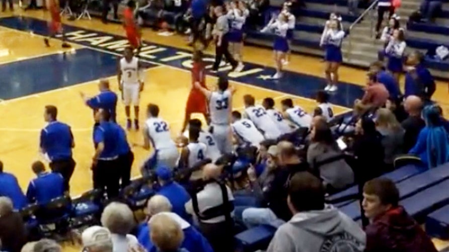Hamilton's (OH) Christian Halcomb should get a scholarship to Monmouth after his celebrations on the bench.