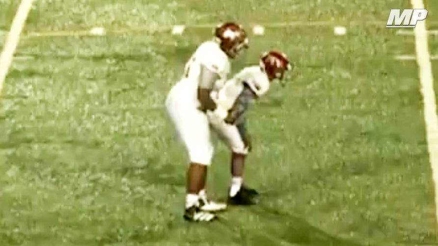 Muskegon's (MI) 6'5" 320-pound sophomore offensive tackle Anthony Bradford gets to play quarterback for one snap and shows off his arm with this 45-yard completion.