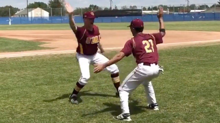 Dominique Gates and Warren King of O'Dea (Seattle, WA) have one of the best handshakes ever seen. Unofficially, they landed the handshake on the first try.