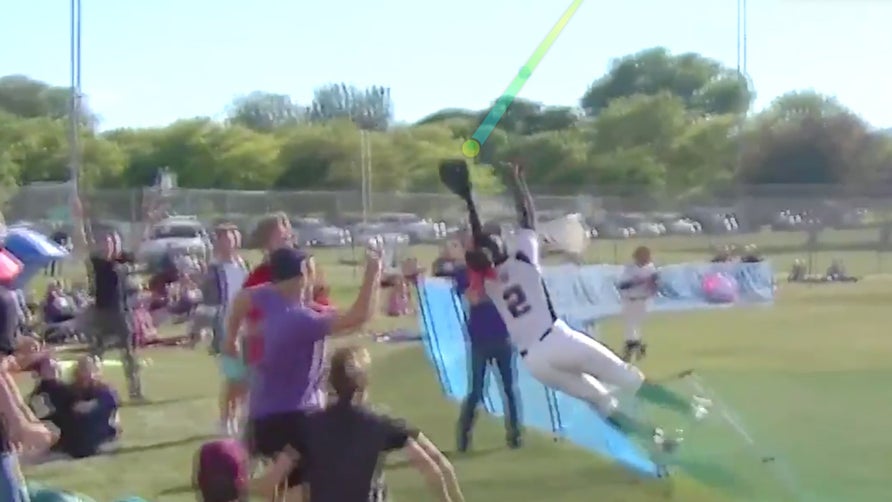 West High outfielder Keisha White gave the world perfection in the form of this unbelievable home run-denying play during the Utah state softball championships.