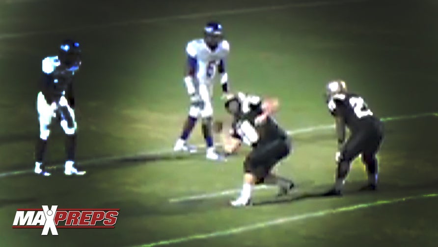 Center passes the ball but defense gets the big stop