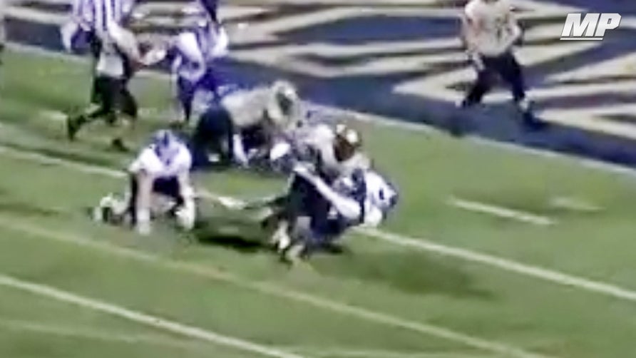 Archbishop Hoban's (OH) 4-star running back Todd Sibley truck sticks through two defenders for score.