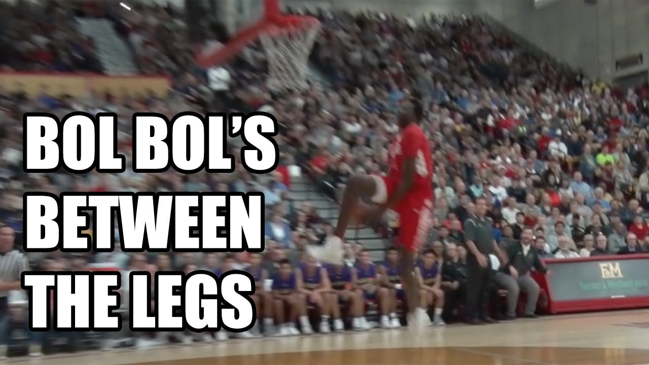 Bol Bol goes in between the legs
