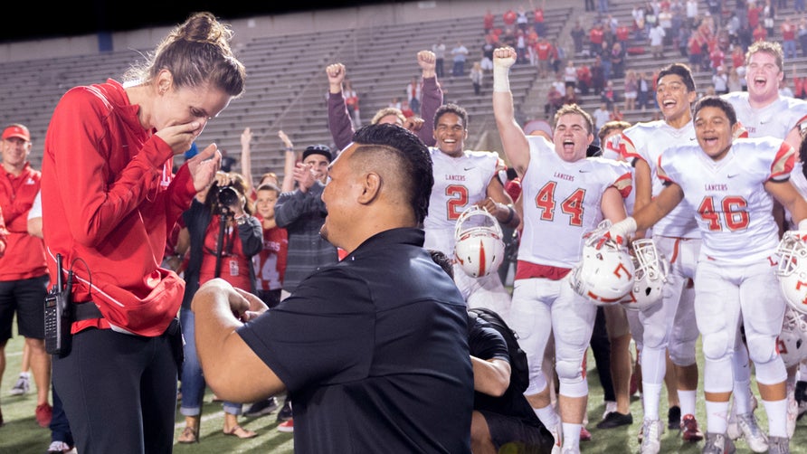 Kekipi pulled off a clever trick play after the Trinity League contest, setting up the fake ceremony and getting on bended knee to propose to his girlfriend while surrounded by the players of both teams.
