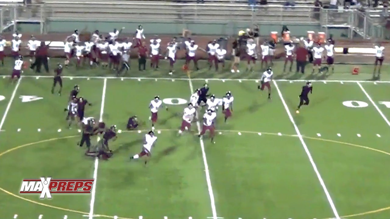 99 yard kick return TD by Justin Watkins