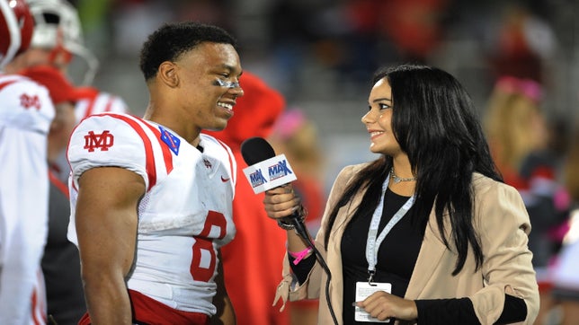 Myckena Guerrero talks to 5-star Wide Receiver Amon-Ra St. Brown of Mater Dei (CA) after the Monarchs 31-21 victory over St. John Bosco (CA).