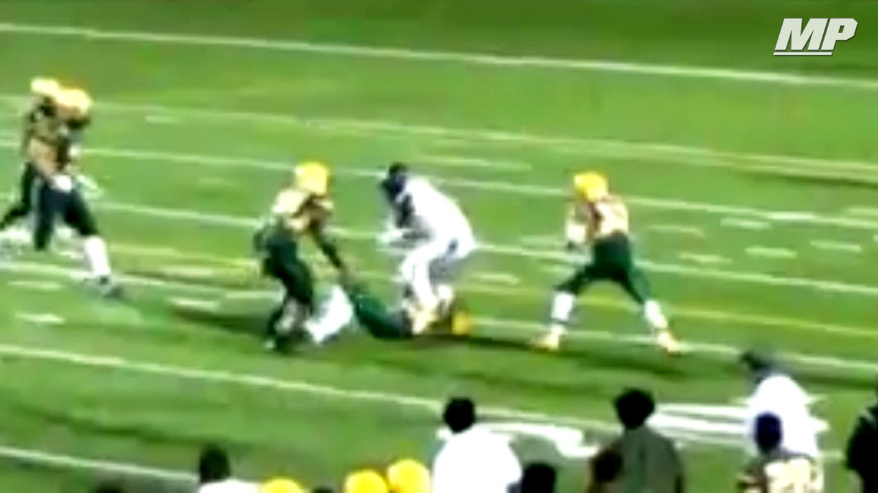 Receiver bulldozes through would be tacklers