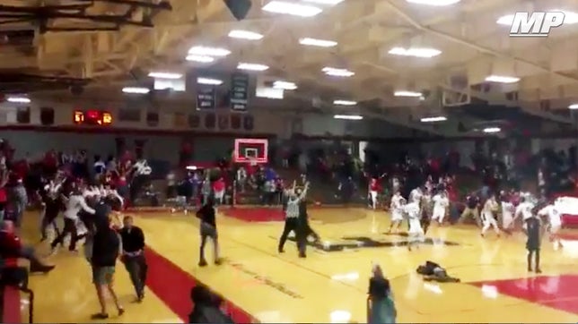 Central Christian Academy (IN) was trailing 62-61 against Indianapolis Arlington (IN) with 0.5 seconds left in the 1A state playoffs then Joshua Clanton grabs the rebound and heaves a full-court shot that goes in for the 64-62 win.

Courtesy Jsteele7777