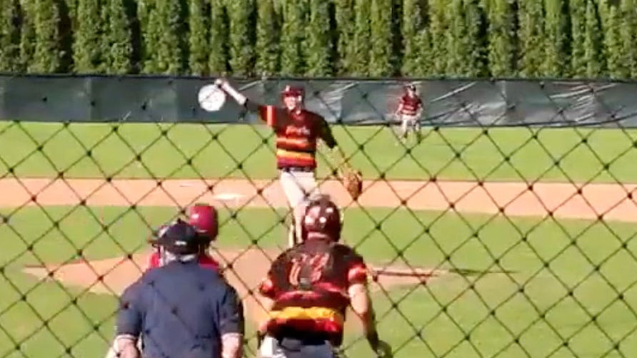 Henry von Hollen of Big Walnut (OH) makes a sweet barehanded snag on the mound.