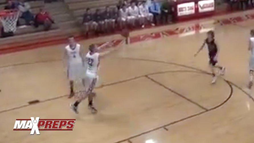 http://www.maxpreps.com/athlete/paul-kaufmann/vsHPxfTnEeKZ5AAmVebBJg/default.htm

Dunkerton's Bryce Rigdon hit a ridiculous shot in the paint then North Tama's Paul Kaufmann hits a full court shot right before the buzzer.