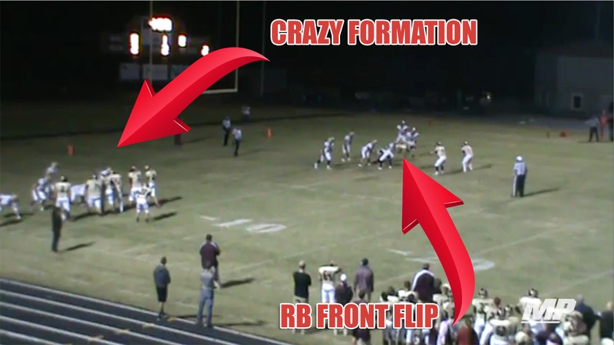 The play is organized chaos from the crazy formation to the RB front flip.