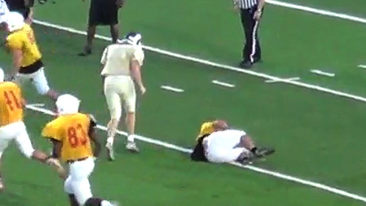 QB destroys defender