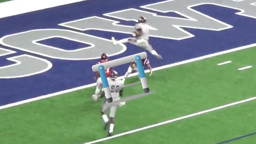 Amare Jones of Heritage (TX) executes a sweet hurdle over the defender at the goal line - and lands it. TD!