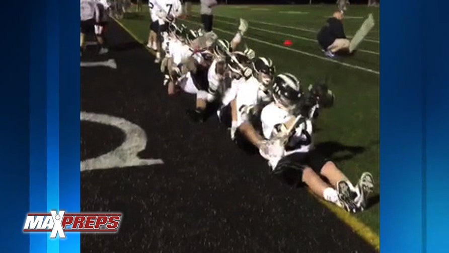 Team celebrating after a goal.
